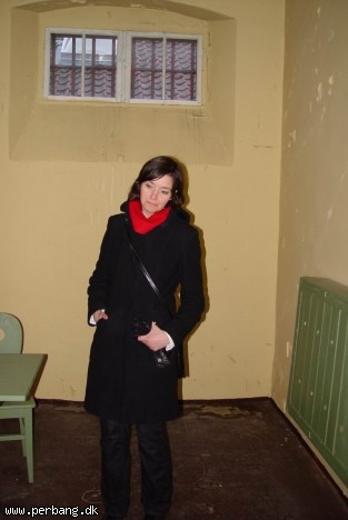 Ellen in a prison cell -